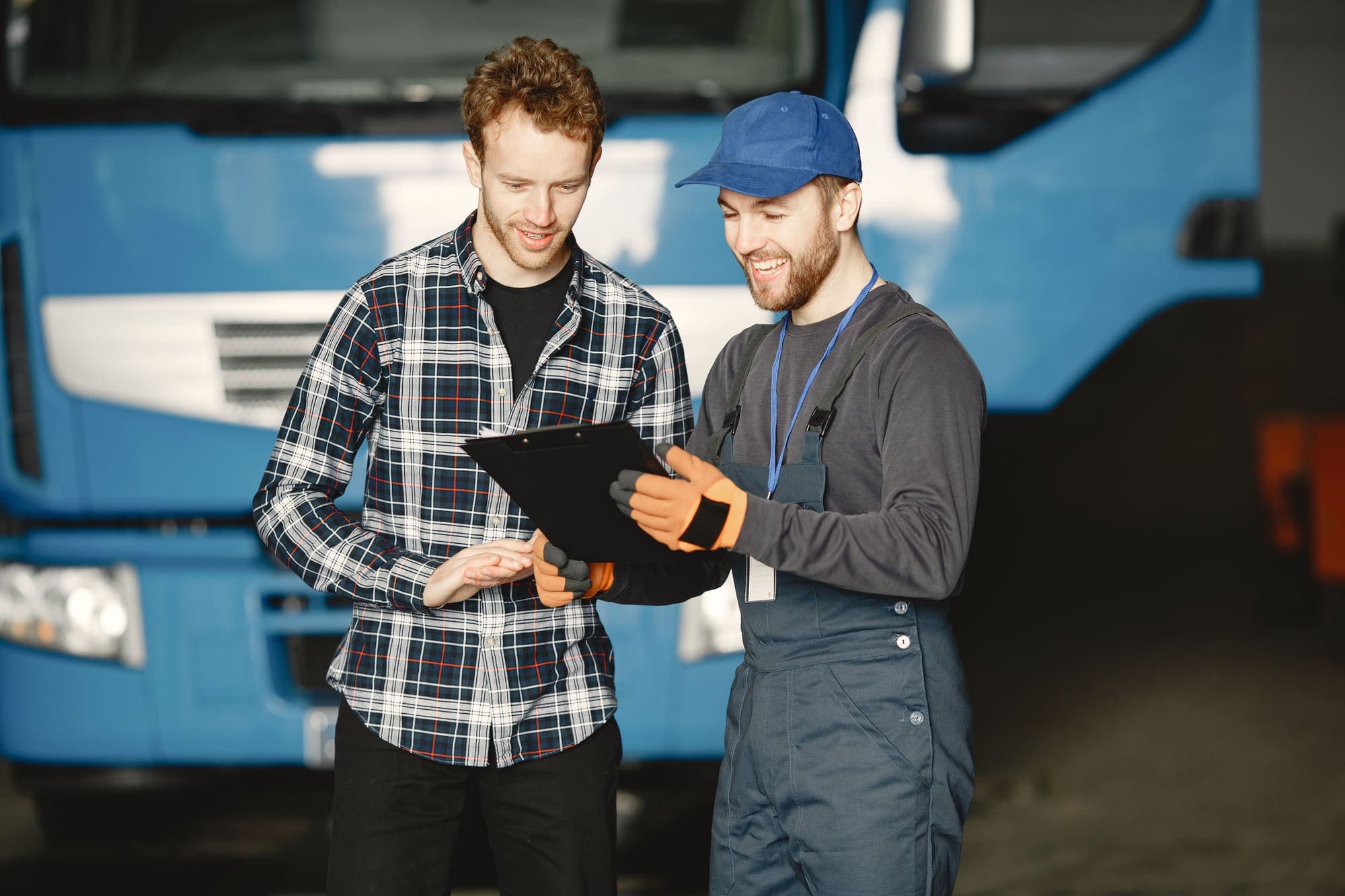 Engineer carrying out a technical audit of workshop equipment and processes.